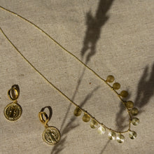 Load image into Gallery viewer, 16k gold vermeil charm earrings with saint emblem clicker fastening