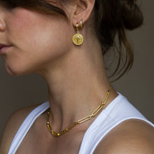 Load image into Gallery viewer, 16k gold vermeil charm earrings with saint emblem clicker fastening