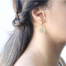 Load image into Gallery viewer, 16k gold vermeil charm earrings with saint emblem clicker fastening 
