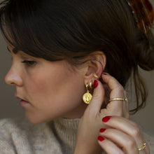 Load image into Gallery viewer, 16k gold vermeil charm earrings with saint emblem clicker fastening
